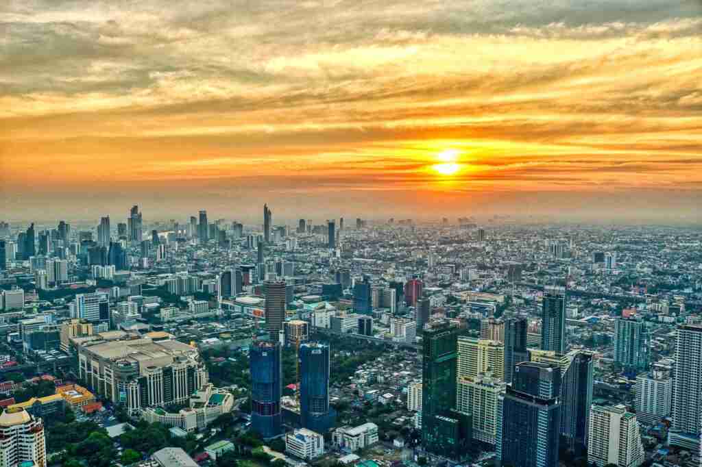 city buildings sunset sunlight 5697483